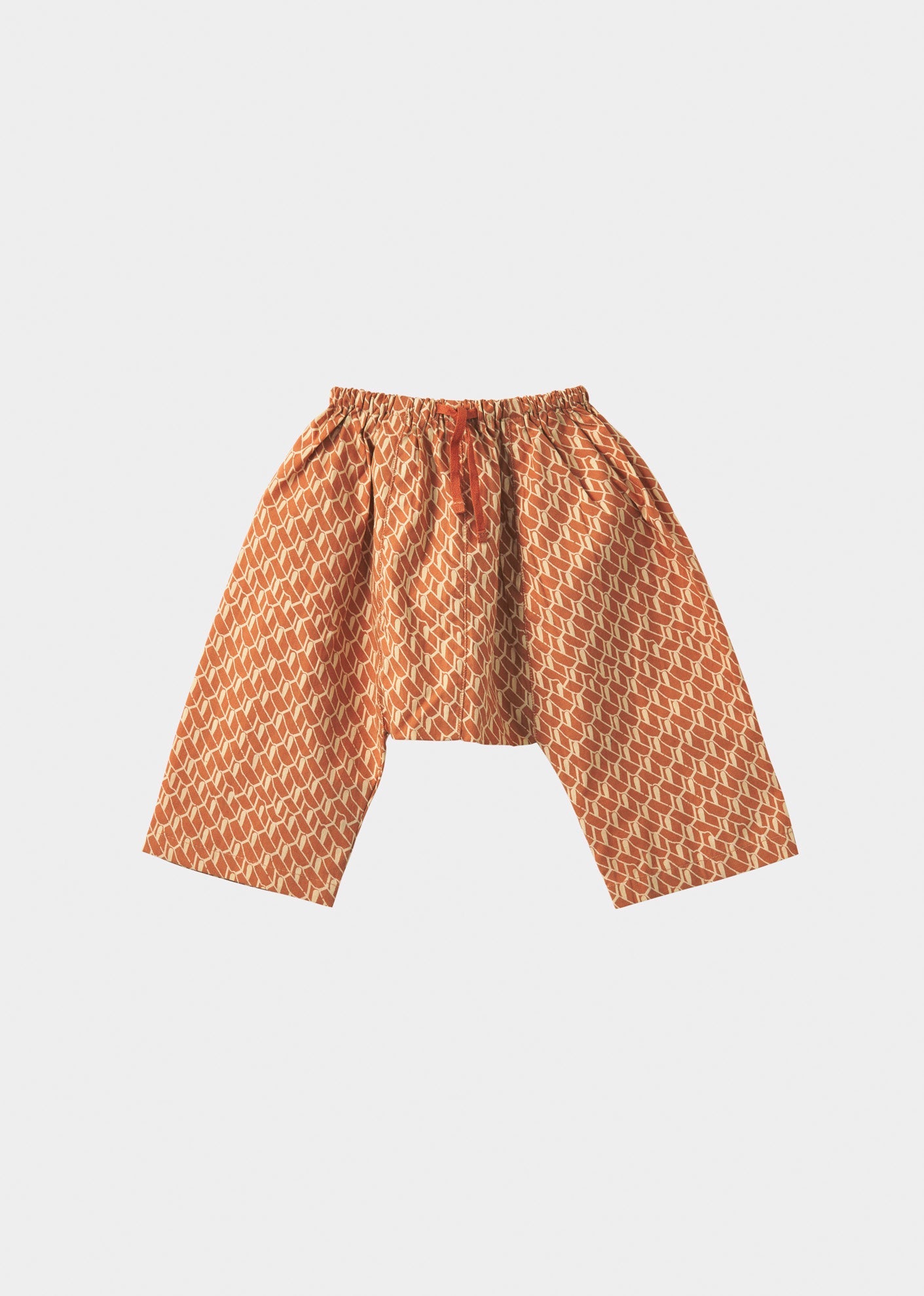 LINUM BABY TROUSERS S24 - APRICOT GEO PRINT