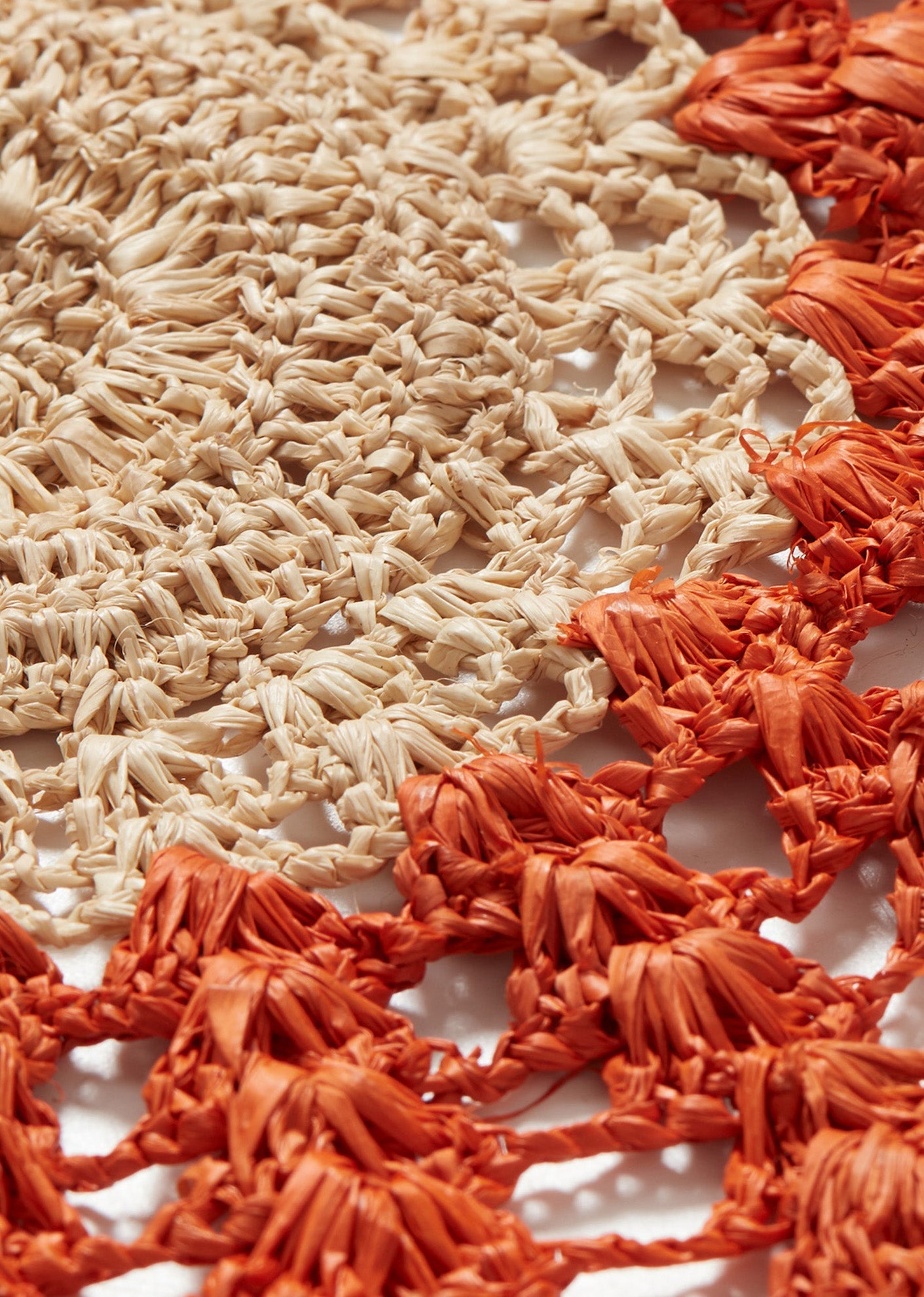 RAFFIA LARGE ROUND PLACEMAT - ORANGE/NATURAL